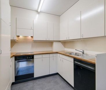 Comfortable living in a well-maintained apartment building - Photo 5