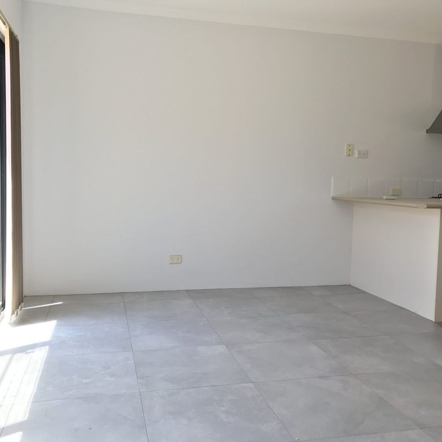 Easy Care Home - Photo 1