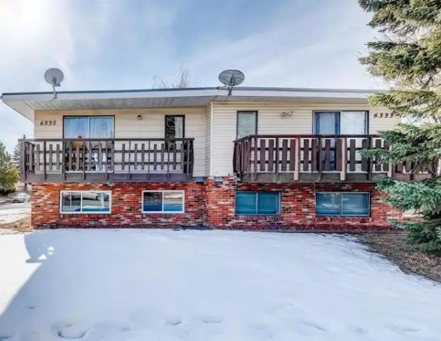Beautiful 3-bed 1.5-bath Duplex | 6335 24 Avenue Northeast, Calgary - Photo 1