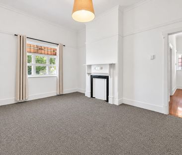 Spacious Three-Bedroom Home with Generous Backyard - Photo 1