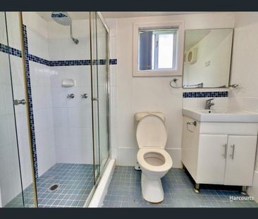 Spacious Family Home with Multiple Living Areas & Huge Parking! - Photo 4