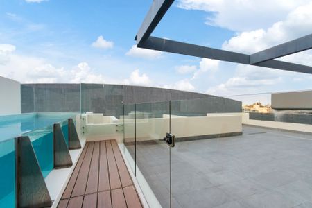 Split Level Penthouse Living&comma; Expansive Terrace & Private Lap Pool - Photo 4