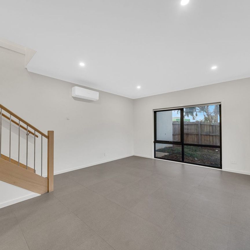 Stylish 3-Bedroom Townhouse with Modern Comforts & Thoughtful Design - Photo 1