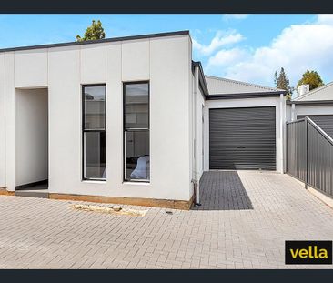 Modern, stylish, low maintenance living at its finest! - Photo 2