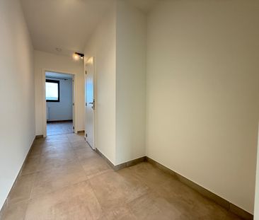 Twee-slaapkamerappartement op een centrale ligging in Ooigem. - Photo 1