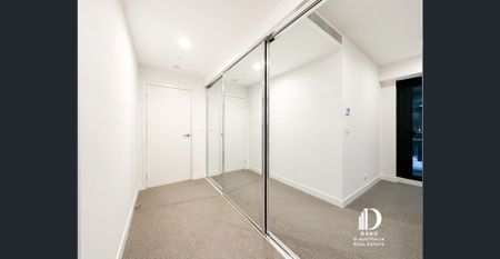 Sophisticated 3-Bedroom Apartment with 2 Study Nooks + Powder Room - Photo 2