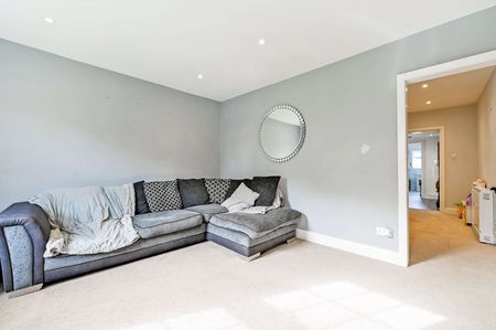 A spacious three bedroom home with allocated parking for two cars. - Photo 2