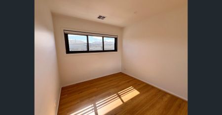 Modern 3-Bed, 2-Bath Family Living - Photo 4