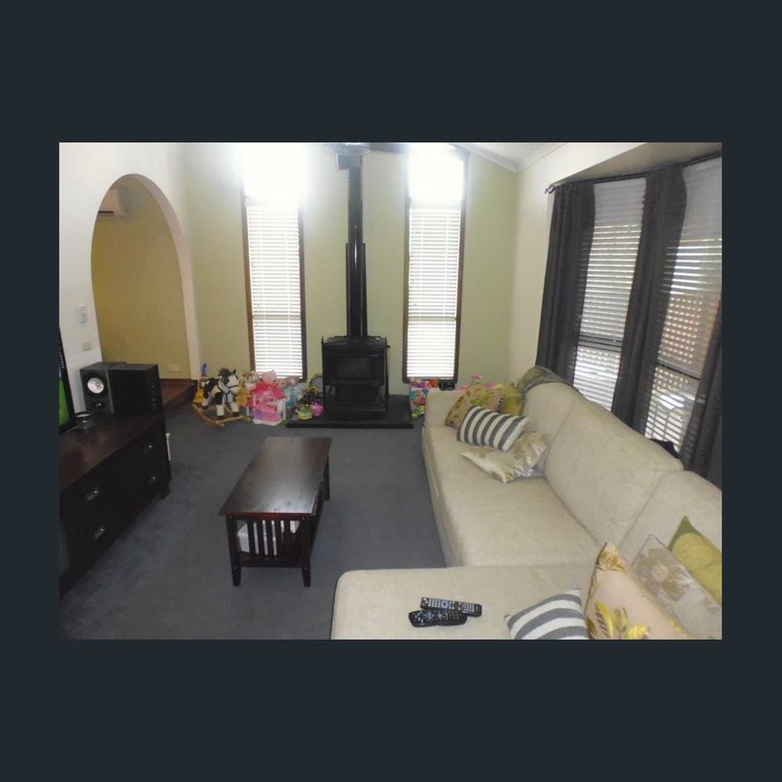 Comfortable Family Living with Space and Convenience - Photo 1