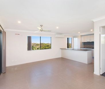 Modern Family Home with Space and Comfort - Photo 1