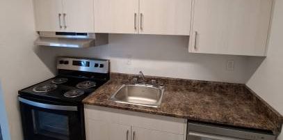 Renovated 2 bdm, Top Floor, Corner, Faces West, Available now!! - Photo 2