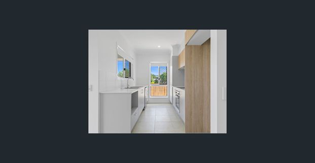 NEAR NEW SPACIOUS, STYLISH AND MODERN 4 BEDROOM HOME IS CALLING YOUR NAME! - Photo 1