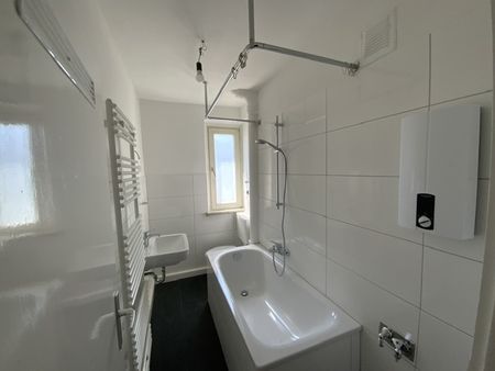 Gemütliche 2-Zimmer-Wohnung mit Wannenbad - Photo 4