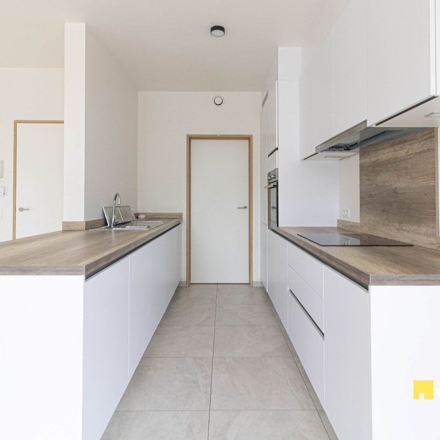 Ruim nieuwbouwappartement (116m²) op de eerste verdieping met overdekt terras en garage - Foto 1