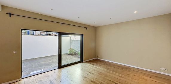 Gelijkvloers app. te huur in Schaarbeek voor € 1.500 met 1 slaapkamer - Photo 2