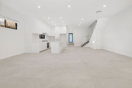 Near new, spacious four bedroom duplex backing onto a reserve - Photo 4