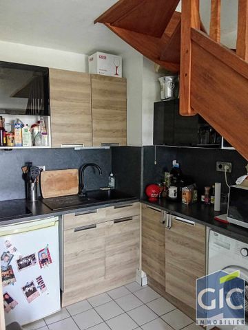 A LOUER, UN APPARTEMENT EN DUPLEX RUE JEAN MONNET - Photo 4