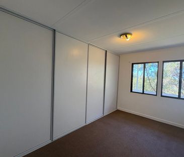 PERFECTLY POSITIONED BY THE BEACH - THIS CHARMING HOME OFFERS COMFO... - Photo 3