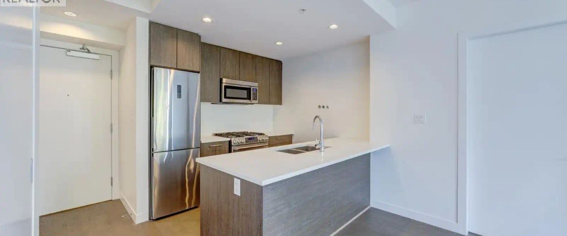 10XX 9060 UNIVERSITY CRESCENT — 2 Bedroom - Photo 1