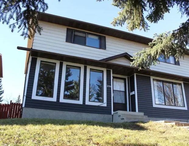 Fully Furnished 4 BDRM DREAM HOME with A/C, Mother in law suite, fenced yard | 244 Edgedale Place, Calgary - Photo 1