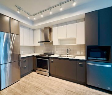 1 Bdrm + Den at Central Green w/ Patio & Greenspace - Photo 3