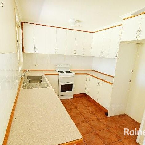 THREE BEDROOM FAMILY HOME WITH LARGE OUTDOOR ENTERTAINEMENT AREA! - Photo 1