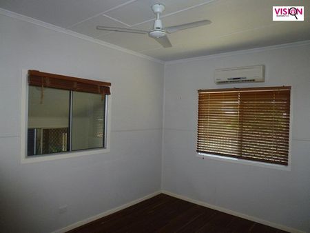 Charming 3-Bedroom Home Close to CBD with Spacious Yard & Powered Shed - Photo 4