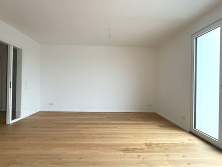 Erstbezug - Neubau 3-Zimmer-Penthouse mit Balkon, Stellplatz, Altersgerecht in 1A-Lage! - Photo 2