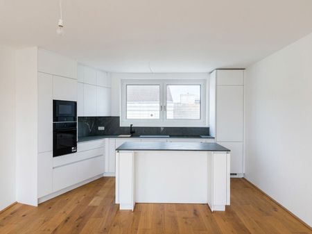 Exklusive Dachgeschoßwohnung mit Traumküche & Sonnenterrasse | Erstbezug | Zentrale Lage zwischen Innenstadt und Bahnhof | Tiefgaragenplatz anmietbar - Photo 3