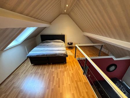 Zeer verzorgde woning met 2 slaapkamers, ruime garage en aangelegd terras op 2a 40ca. - Photo 5