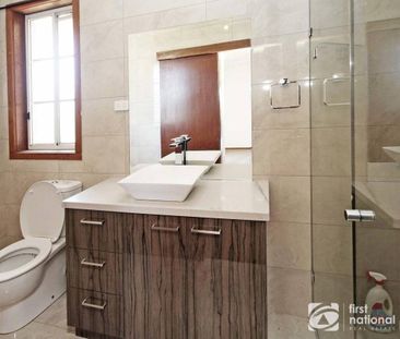 Sitting Amongst the Flowers - Photo 2