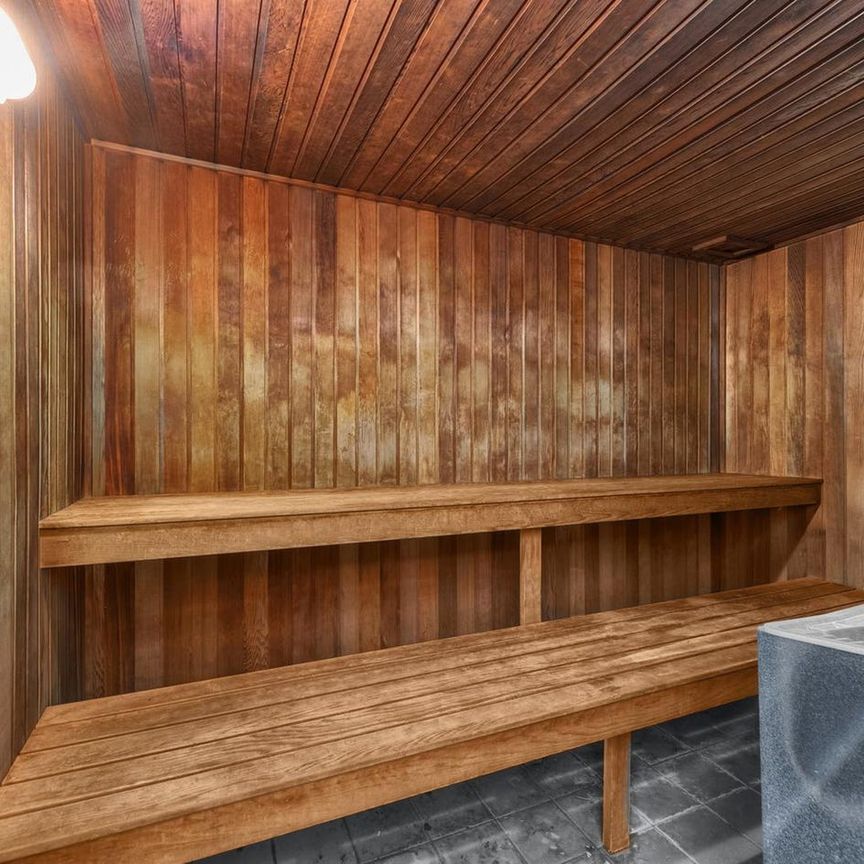 Top-Floor Loft Living with Timeless Industrial Charm - Photo 1