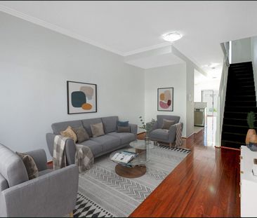 Spacious Two Bedroom Townhouse with Three Car Garage - Photo 2