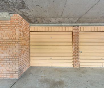 First-Floor Full Brick Two-Bedroom Unit with Single Garage! - Photo 4