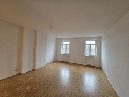 Coole Dachgeschosswohnung mit Dachterrasse (+ zusätzlicher Nutzung des großen begehbaren Flachdaches) - Photo 2