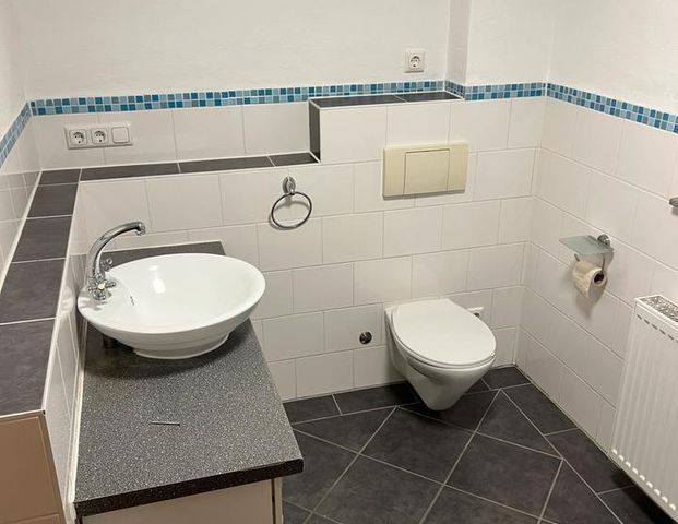 Mietwohnung EG mit kleinem Garten - Foto 1