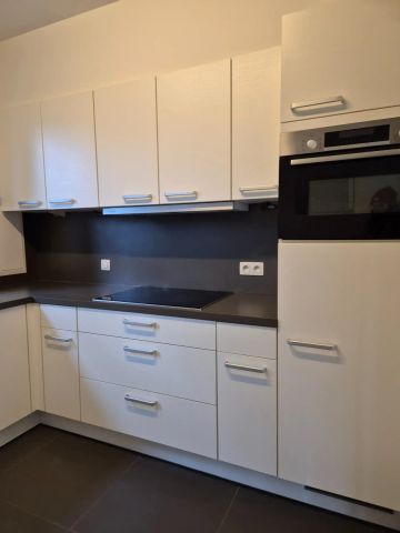 Gelijkvloers appartement met groot terras, tuin en garage. - Photo 4