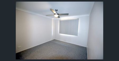 Spacious Family Home with Multiple Living Areas & Modern Comforts - Photo 4