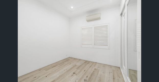 Charming Newly Renovated 2-Bedroom Home - Photo 1