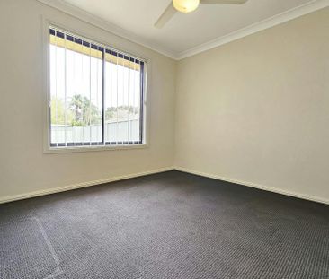 Well-appointed four-bedroom family home - Photo 6