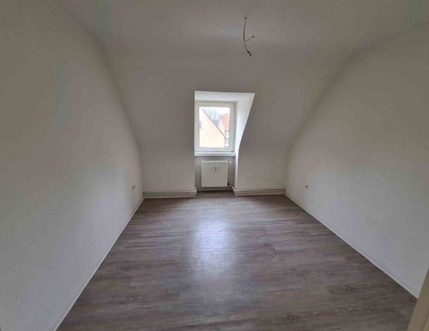 Dachgeschoss-Wohnung in Grevenbroich-Wevelinghoven - Foto 1