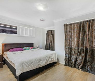 Stylish 4-Bedroom Family Home in Prime Location - Photo 2