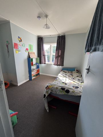 Sunny Family Home with Large Fully Fenced Section - Photo 4