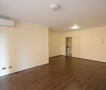 Neat & Tidy Unit with Access to Pool & Tennis Court - Photo 1