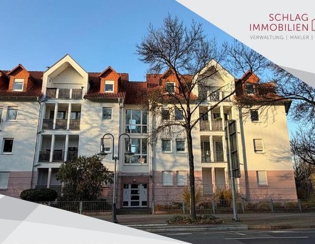 Schöne 2-Zimmer-Dachgeschosswohnung gegenüber dem Schloss Philippsruhe inkl. TG-Stellplatz - Foto 1