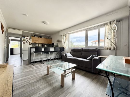 NIMES / GREZAN T3 MEUBLE AVEC CLIMATISATION, PARKING ET CAVE - Photo 1