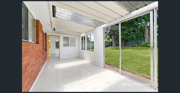 Refreshed brick home with brand new kitchen - Photo 1