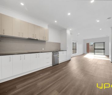 Modern & Spacious 4-Bedroom Home in a Peaceful Beveridge Location - Photo 4