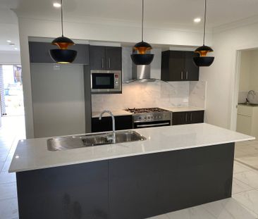 Contemporary Family Living with Space, Style & Convenience - Photo 4