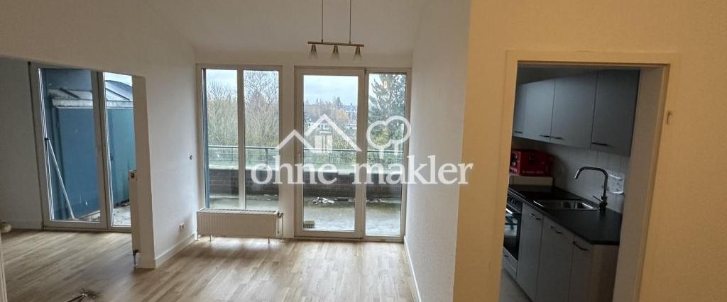 Helle Dachgeschosswohnung mit neuer EBK & neuem Bad - Foto 1